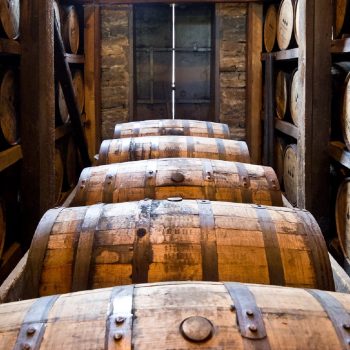 Whisky barrels in warehouse